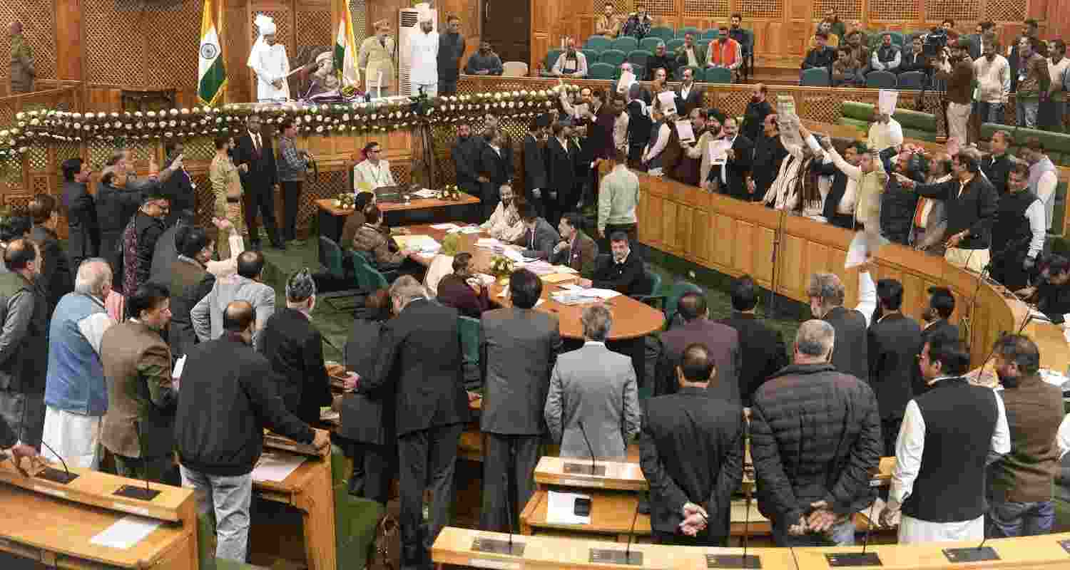BJP MLAs (right) protest during a session of the Jammu and Kashmir Assembly in Srinagar on Thursday. BJP MLAs (right) protest during a session of the Jammu and Kashmir Assembly in Srinagar on Thursday.