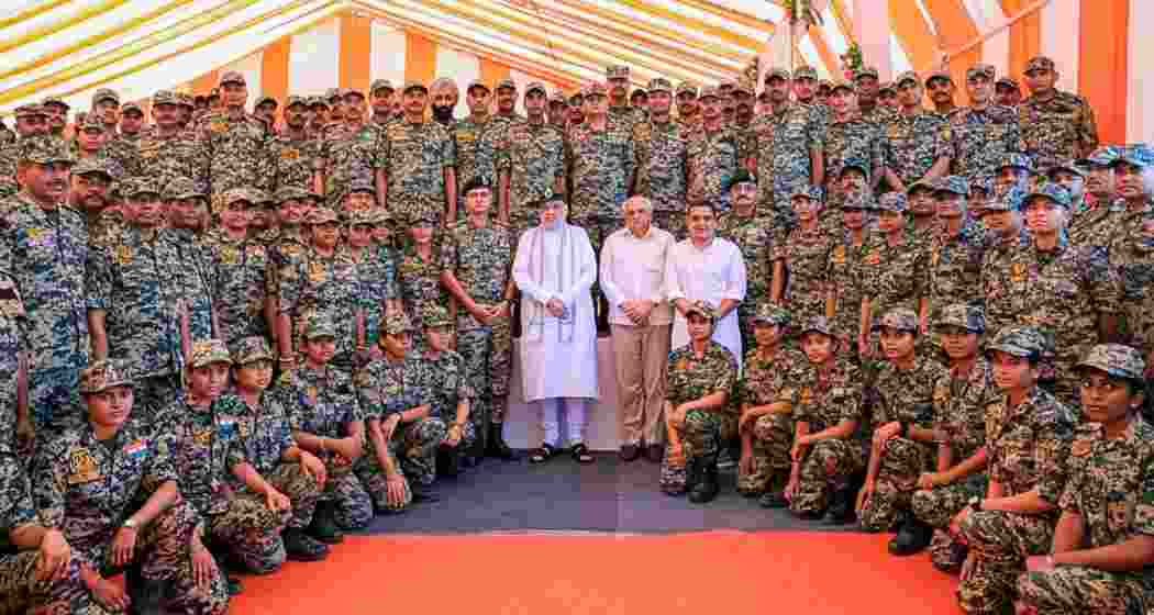Union Home Minister Amit Shah with BSF personnel stationed at the G-6 and G-13 Border Outposts along the Indo-Pak International Border in Bhuj, Gujarat, on Friday. Union Home Minister Amit Shah with BSF personnel stationed at the G-6 and G-13 Border Outposts along the Indo-Pak International Border in Bhuj, Gujarat, on Friday.