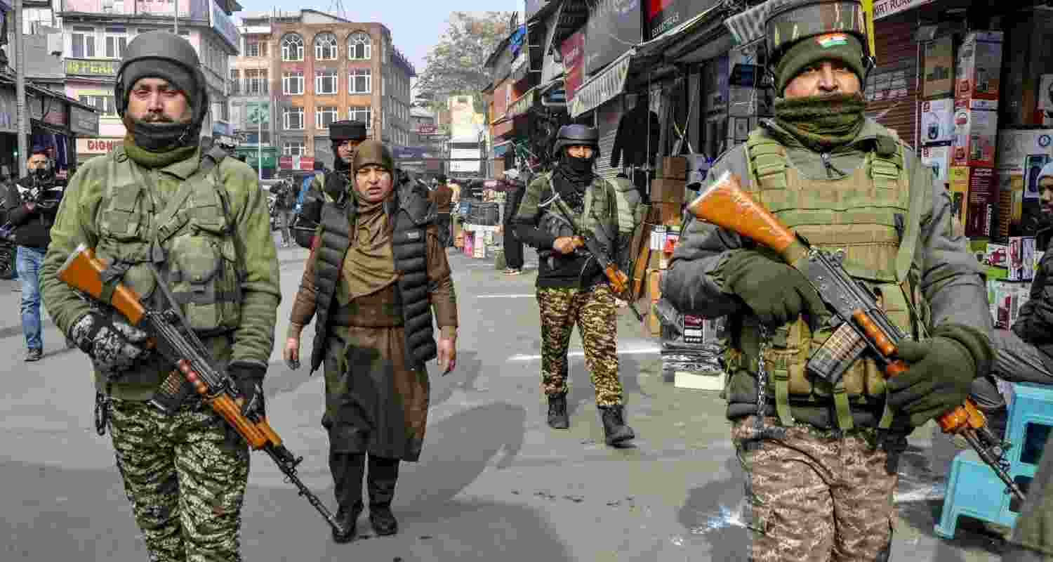 Armed security personnel during a Cordon and Search Operation (CASO), in Srinagar on Friday. Armed security personnel during a Cordon and Search Operation (CASO), in Srinagar on Friday.