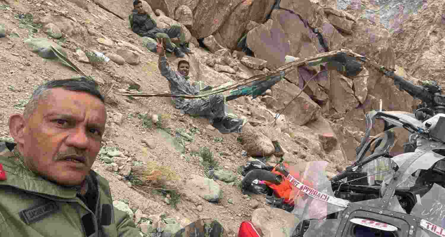 Army personnel at the crash site of a Cheetah helicopter in Ladakh’s Tangste region near Leh. Army personnel at the crash site of a Cheetah helicopter in Ladakh’s Tangste region near Leh.