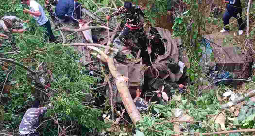 Rescue personnel at the site after an Army truck plunged into a gorge along NH-13 in Arunachal Pradesh's West Kameng district, killing one soldier and injuring two others. Rescue personnel at the site after an Army truck plunged into a gorge along NH-13 in Arunachal Pradesh's West Kameng district, killing one soldier and injuring two others.