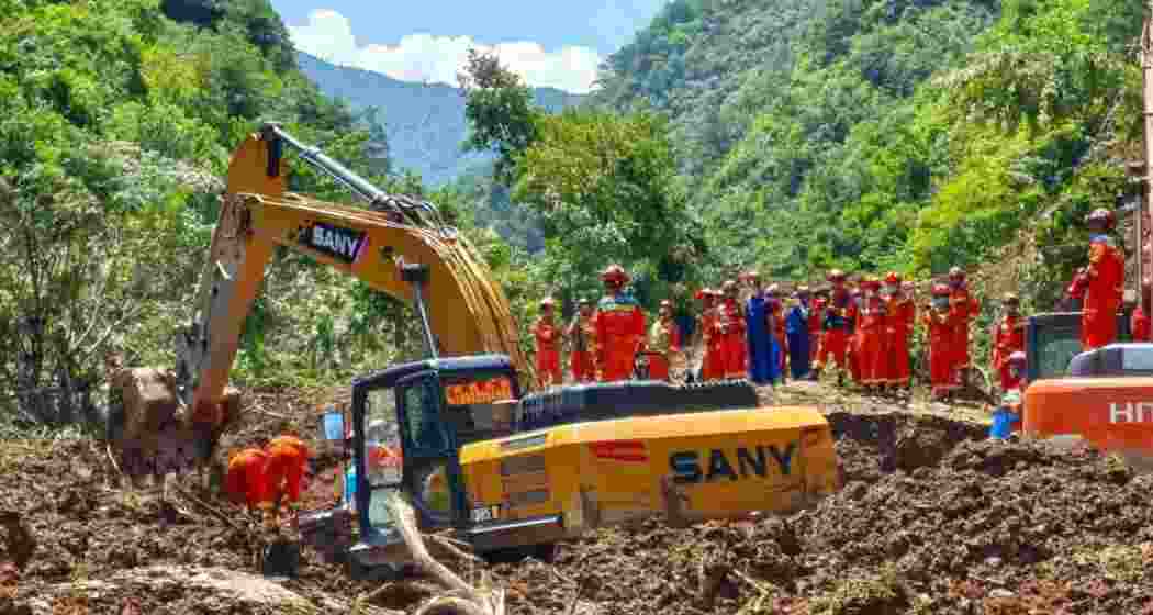 Rescue personnel clear debris after a rain-triggered landslide at a construction site in Lohit district, Arunachal Pradesh, where two Bihar labourers were killed and four others injured. Rescue personnel clear debris after a rain-triggered landslide at a construction site in Lohit district, Arunachal Pradesh, where two Bihar labourers were killed and four others injured.