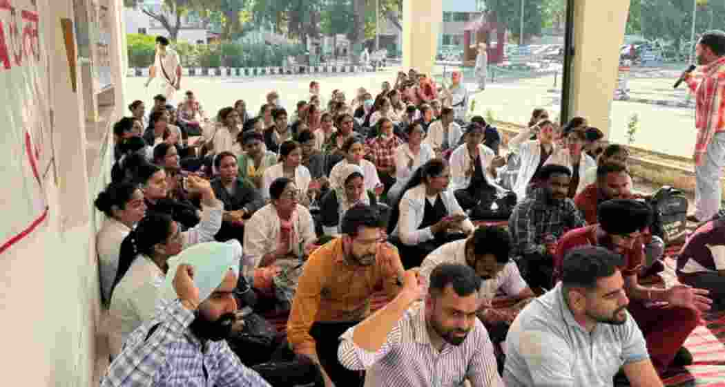 Defying the Punjab government's decision to invoke the Essential Services (Maintenance) Act, nursing staff went on a strike at Rajindra Medical College and Hospital, Patiala, on Thursday. Defying the Punjab government's decision to invoke the Essential Services (Maintenance) Act, nursing staff went on a strike at Rajindra Medical College and Hospital, Patiala, on Thursday.