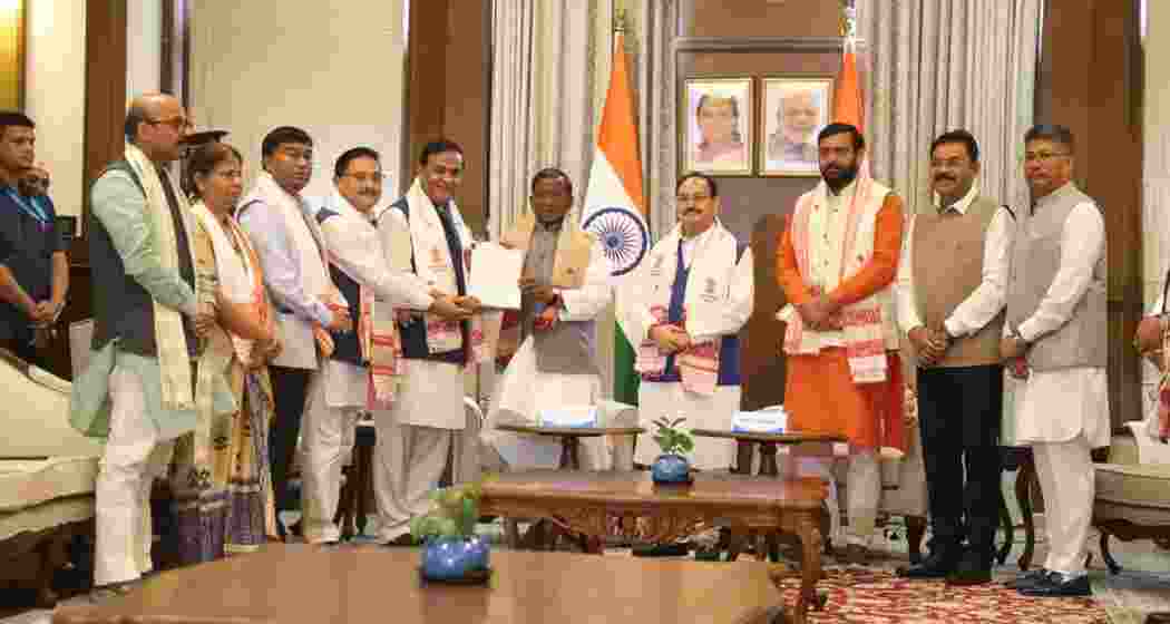 NDA leaders led by Himanta Biswa Sarma submitted their claim to Assam Governor Lakshman Prasad Acharya at Lok Bhavan in Guwahati to form the government after securing a majority in the Assembly. NDA leaders led by Himanta Biswa Sarma submitted their claim to Assam Governor Lakshman Prasad Acharya at Lok Bhavan in Guwahati to form the government after securing a majority in the Assembly.