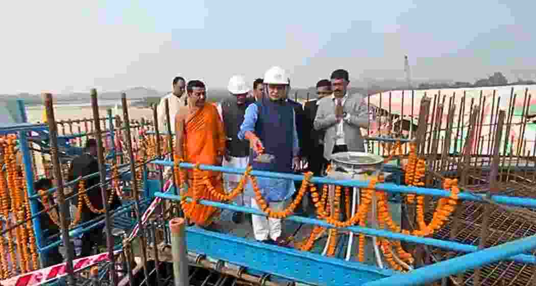 Himanta Biswa Sarma performing 'bhumi pujan' for the Palasbari-Sualkuchi bridge, calling it transformative for Brahmaputra's shores. The Rs 3,197.20 crore project aims for completion by June 2028. Himanta Biswa Sarma performing 'bhumi pujan' for the Palasbari-Sualkuchi bridge, calling it transformative for Brahmaputra's shores. The Rs 3,197.20 crore project aims for completion by June 2028.
