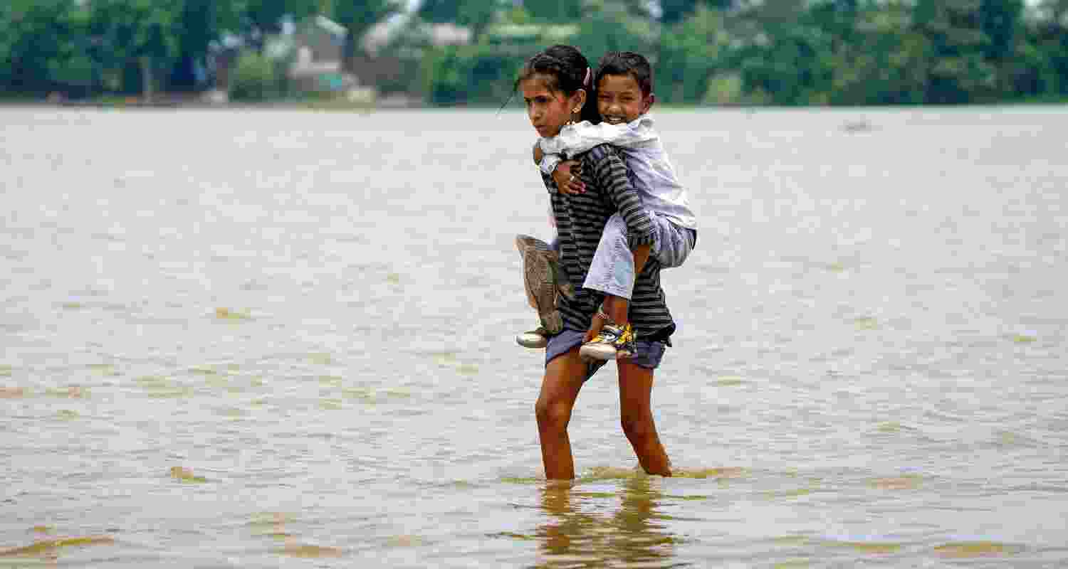 Assam floods have affected over 37,000 people across six districts, killed one person in Sonitpur and submerged crops, damaging homes and roads. Assam floods have affected over 37,000 people across six districts, killed one person in Sonitpur and submerged crops, damaging homes and roads.