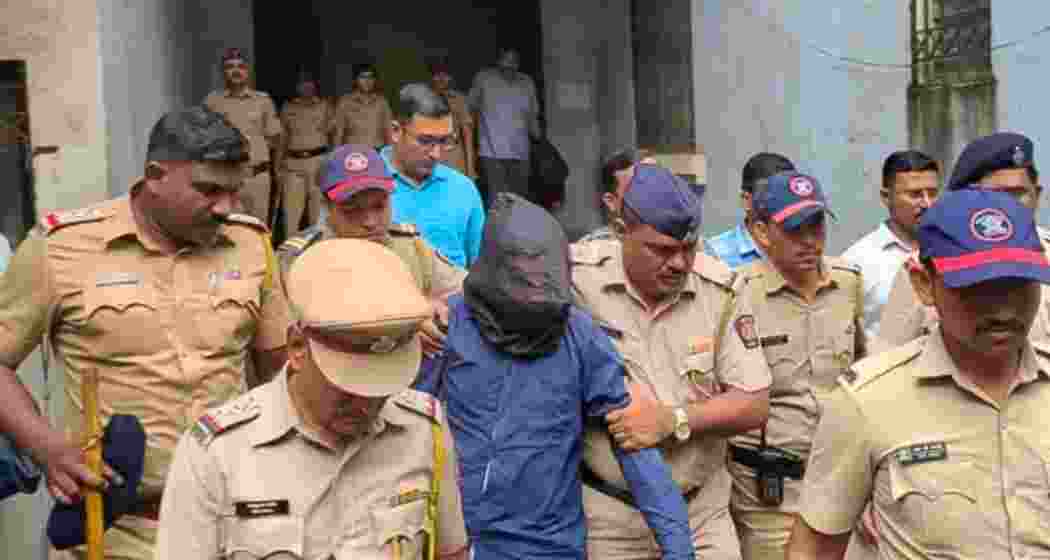 Accused in the Badlapur school sexual assault case being taken to court. File photo. Accused in the Badlapur school sexual assault case being taken to court. File photo.