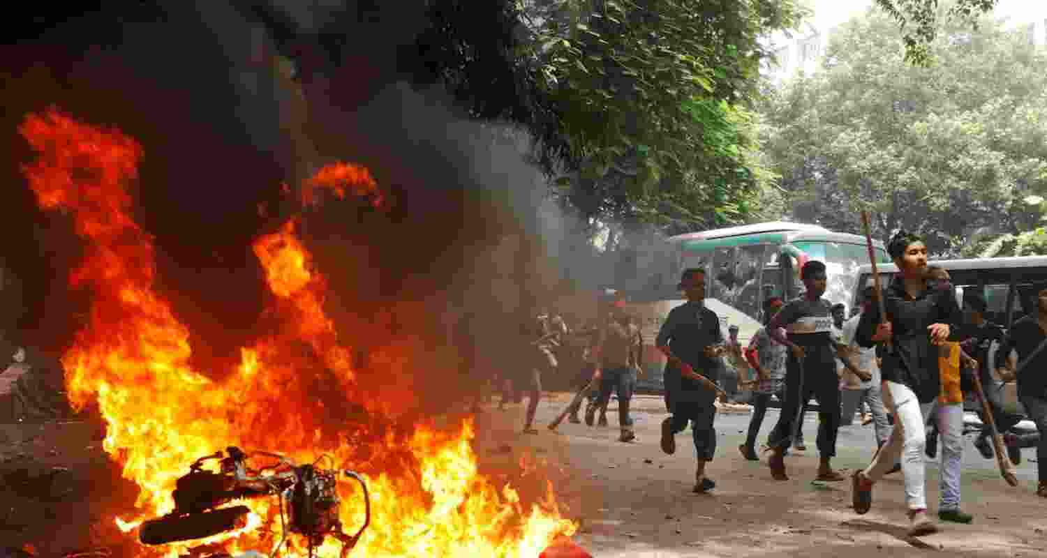 Bangladesh clashes. Image via PTI. Bangladesh clashes. Image via PTI.