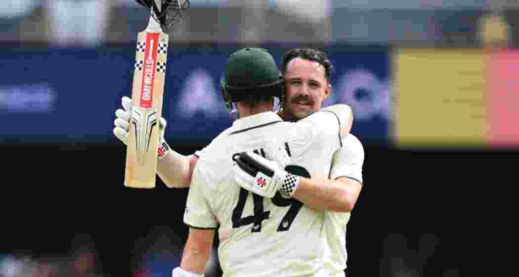 Travis Head celebrates his century alongside Steve Smith, as their 241-run partnership puts Australia in a commanding position on day two of the third Test against India in Bhubaneswar. Travis Head celebrates his century alongside Steve Smith, as their 241-run partnership puts Australia in a commanding position on day two of the third Test against India in Bhubaneswar.