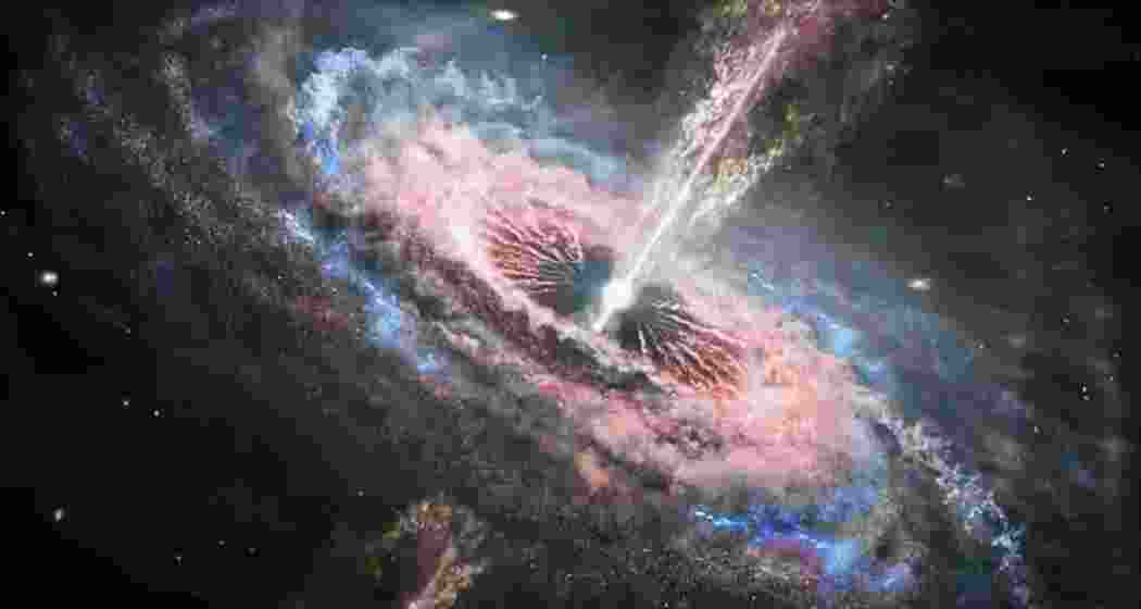 Astronomers have captured the first-ever image of two supermassive black holes orbiting each other within quasar OJ287, revealing a rare cosmic dance nearly five billion light-years away. (Representative image) Astronomers have captured the first-ever image of two supermassive black holes orbiting each other within quasar OJ287, revealing a rare cosmic dance nearly five billion light-years away. (Representative image)