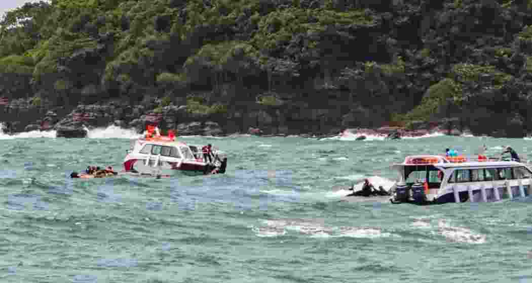 Rescue personnel carry out operations after a speedboat carrying Indian tourists capsized near Hon May Rut Ngoai off Phu Quoc Island, Vietnam, on Saturday. Rescue personnel carry out operations after a speedboat carrying Indian tourists capsized near Hon May Rut Ngoai off Phu Quoc Island, Vietnam, on Saturday.