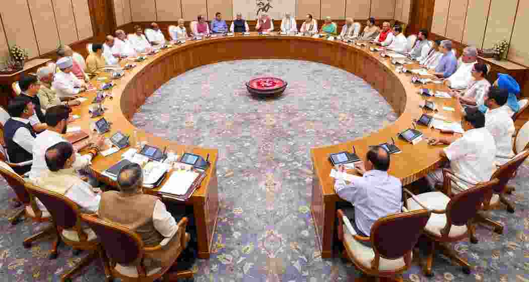 Prime Minister Narendra Modi (C) holding the first cabinet meeting, in New Delhi Prime Minister Narendra Modi (C) holding the first cabinet meeting, in New Delhi