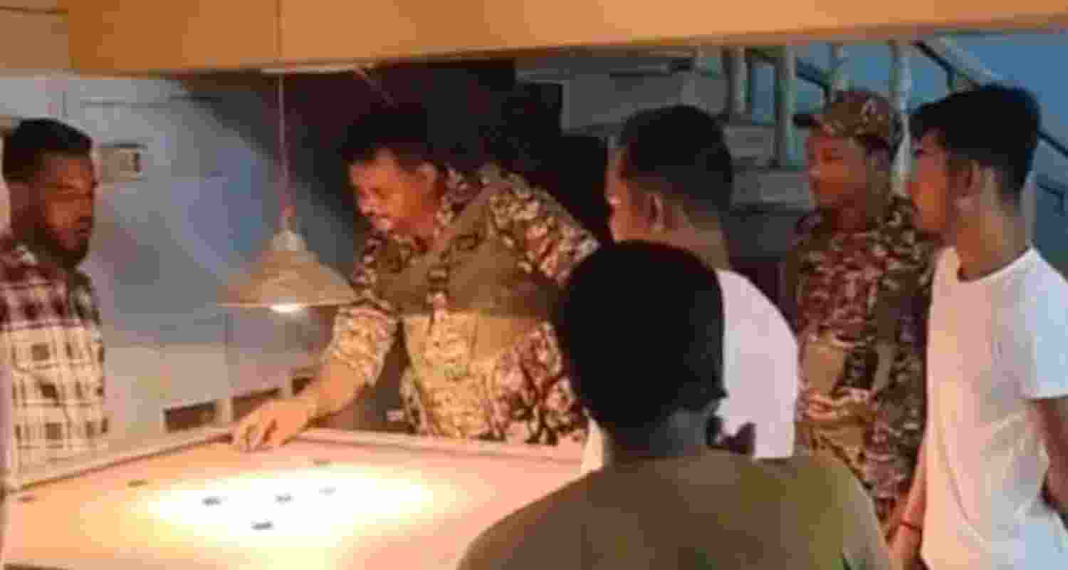 In the footage, three men in uniform can be seen gathered around a carrom board, with one of them even taking a shot. In the footage, three men in uniform can be seen gathered around a carrom board, with one of them even taking a shot.
