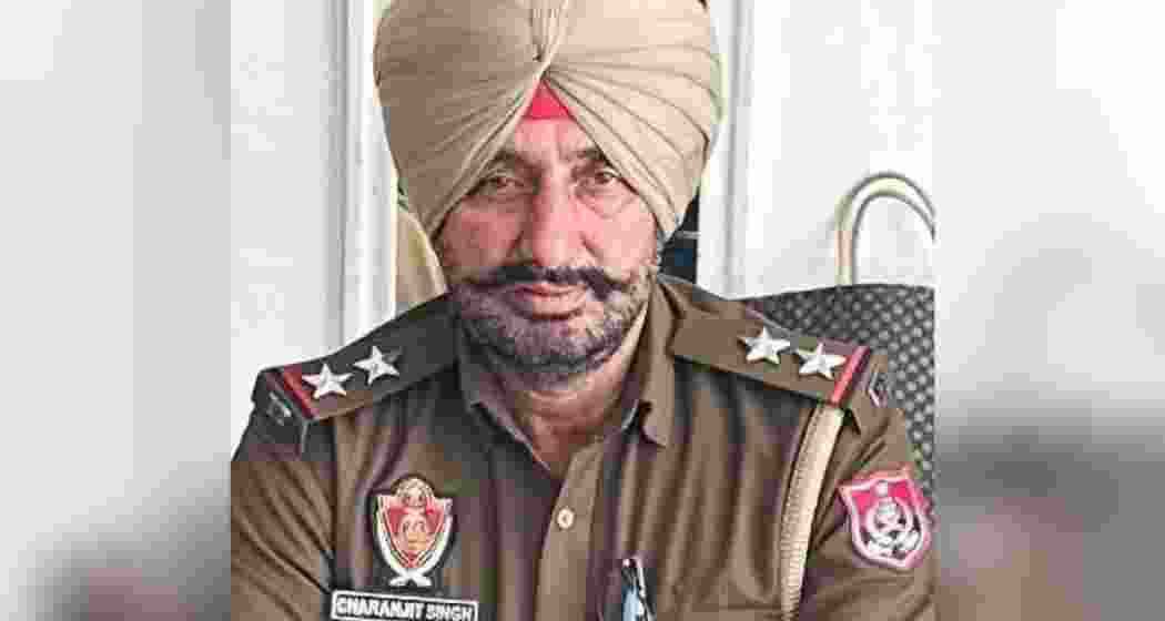 Slain Sub-Inspector Charanjit Singh (file photo), who was shot dead on Wednesday night while intervening in a group clash in Kot Mohammad Khan village, Tarn Taran district, Punjab. Slain Sub-Inspector Charanjit Singh (file photo), who was shot dead on Wednesday night while intervening in a group clash in Kot Mohammad Khan village, Tarn Taran district, Punjab.