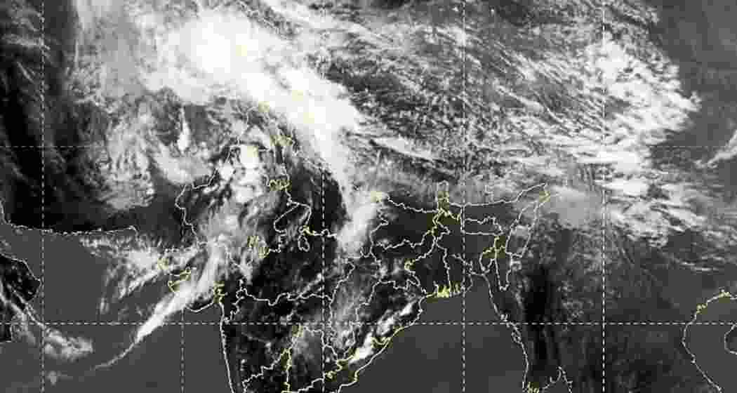 IMD satellite imagery shows dark clouds over Delhi-NCR as a massive cloud band triggers hailstorms and strong winds across North and Central India. IMD satellite imagery shows dark clouds over Delhi-NCR as a massive cloud band triggers hailstorms and strong winds across North and Central India.
