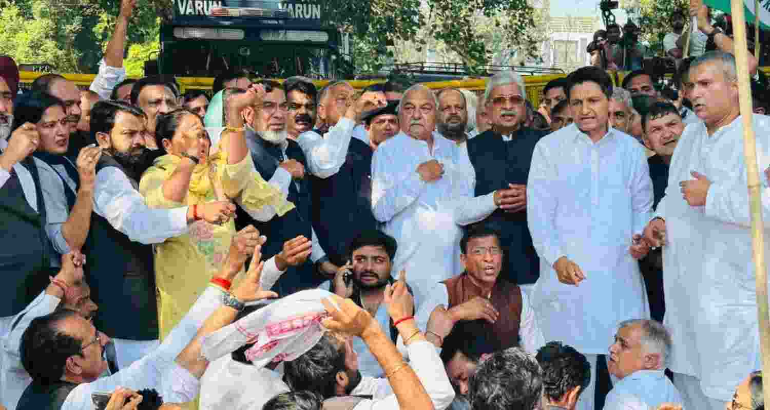 Congress leaders, including Bhupinder Singh Hooda, stage a protest against MGNREGA changes in Chandigarh. Congress leaders, including Bhupinder Singh Hooda, stage a protest against MGNREGA changes in Chandigarh.