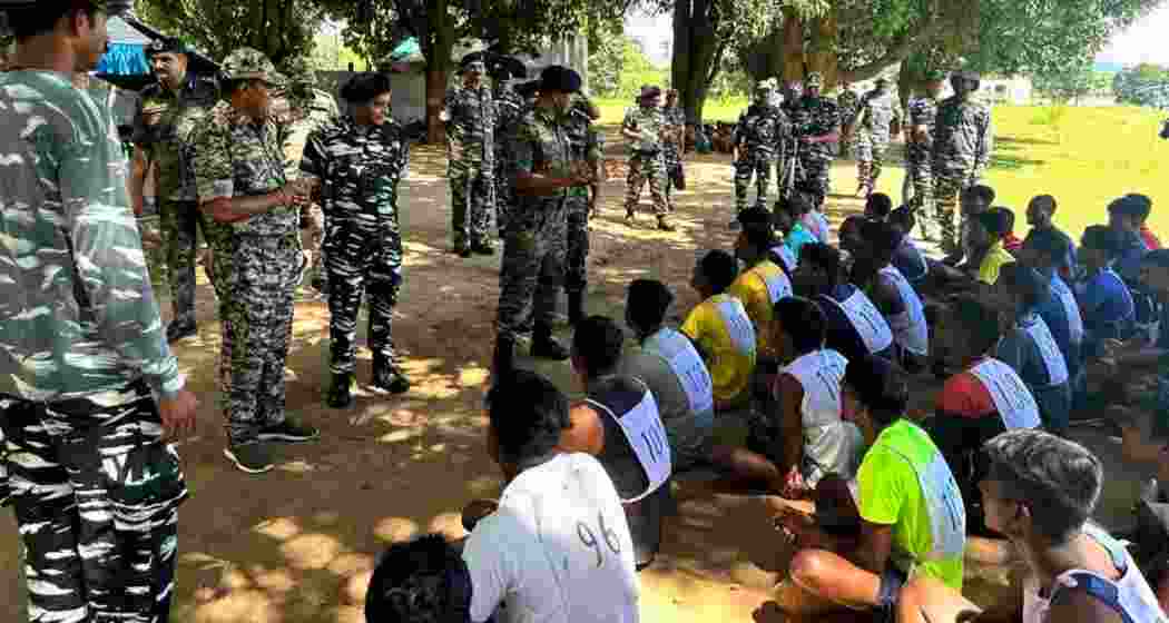 CRPF officials interact with locals in Bastar. CRPF officials interact with locals in Bastar.