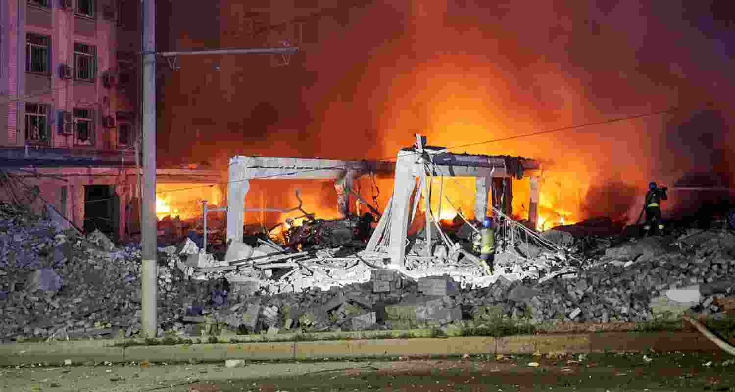 Ukrainian firefighters put out a blaze in Dnipro after a missile attack by Russia. Ukrainian firefighters put out a blaze in Dnipro after a missile attack by Russia.