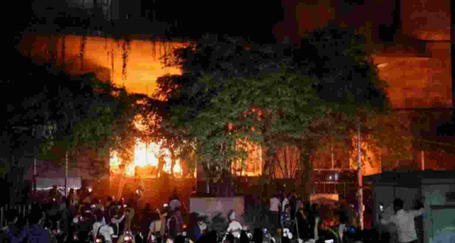 A group of people set fire to The Daily Star newspaper office building, following the death of Sharif Osman Hadi, a student leader who had been receiving treatment in Singapore after being shot in the head, in Dhaka. A group of people set fire to The Daily Star newspaper office building, following the death of Sharif Osman Hadi, a student leader who had been receiving treatment in Singapore after being shot in the head, in Dhaka.