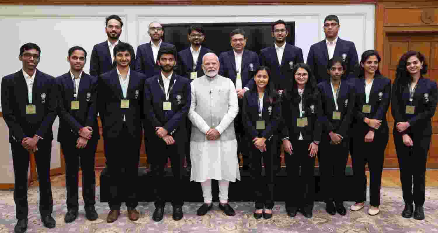 Prime Minister Narendra Modi posing with India's chess prodigies. Prime Minister Narendra Modi posing with India's chess prodigies.