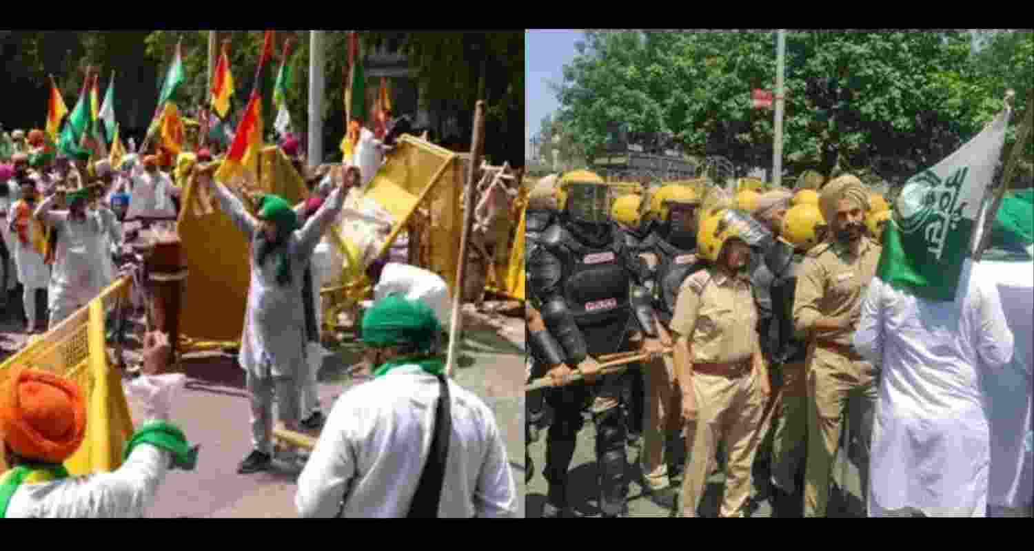 Farmers raise slogans as police try to block their entry into Chandigarh. Farmers raise slogans as police try to block their entry into Chandigarh.