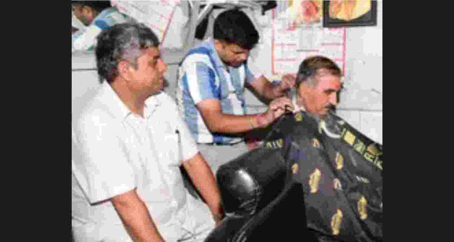 Himachal Pradesh Chief Minister Sukhvinder Singh Sukhu gets a haircut at a local barber shop in Chamba. Himachal Pradesh Chief Minister Sukhvinder Singh Sukhu gets a haircut at a local barber shop in Chamba.