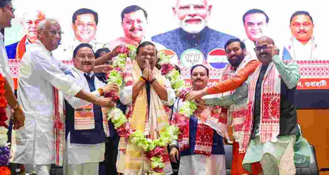 Newly elected leader of the Assam BJP Legislature Party Himanta Biswa Sarma being garlanded by Union Minister and former BJP National President J.P. Nadda, Haryana Chief Minister Nayab Singh Saini, AGP President Atul Bora and Assam BJP President Dilip Saikia during the Assam BJP Legislature Party meeting at the Atal Bihari Vajpayee Bhawan in Guwahati, on Sunday. Newly elected leader of the Assam BJP Legislature Party Himanta Biswa Sarma being garlanded by Union Minister and former BJP National President J.P. Nadda, Haryana Chief Minister Nayab Singh Saini, AGP President Atul Bora and Assam BJP President Dilip Saikia during the Assam BJP Legislature Party meeting at the Atal Bihari Vajpayee Bhawan in Guwahati, on Sunday.