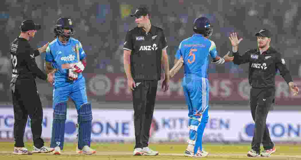 India's KL Rahul and Washington Sundar being congratulated by New Zealand's players after winning the first ODI cricket match of a series between India and New Zealand, at Kotambi Stadium, in Vadodara, Gujarat, Sunday. India's KL Rahul and Washington Sundar being congratulated by New Zealand's players after winning the first ODI cricket match of a series between India and New Zealand, at Kotambi Stadium, in Vadodara, Gujarat, Sunday.