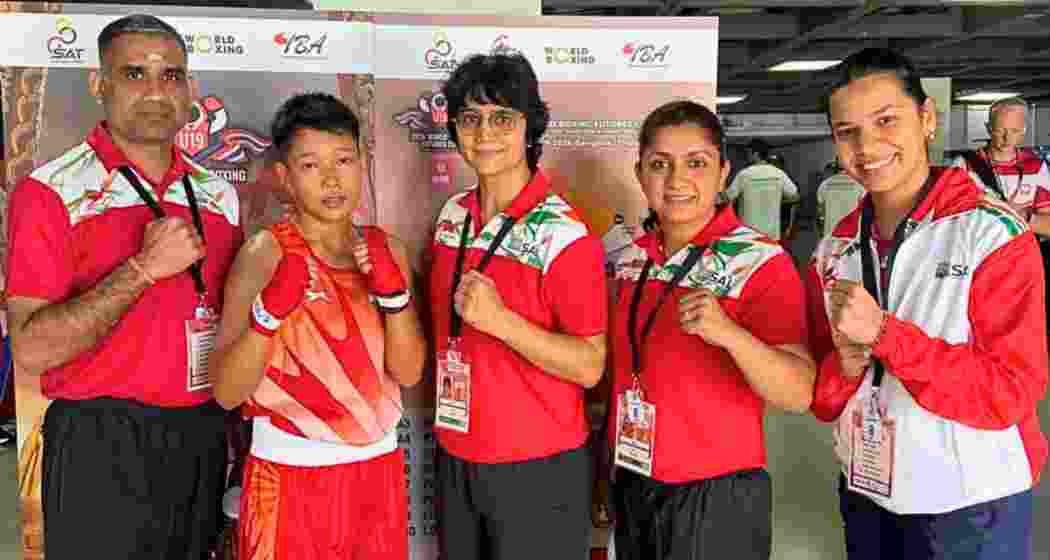 Joyshree Devi Chirom poses with the coaching staff after her win at the World Boxing Futures Cup in Bangkok. Joyshree Devi Chirom poses with the coaching staff after her win at the World Boxing Futures Cup in Bangkok.