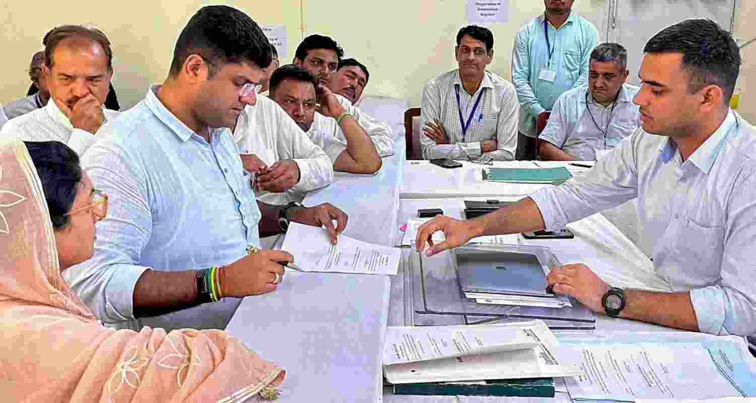 JJP candidate from Uchana Kalan assembly constituency and former deputy chief minister Dushyant Chautala files his nomination papers for Haryana Assembly elections, in Jind, Thursday. JJP candidate from Uchana Kalan assembly constituency and former deputy chief minister Dushyant Chautala files his nomination papers for Haryana Assembly elections, in Jind, Thursday.
