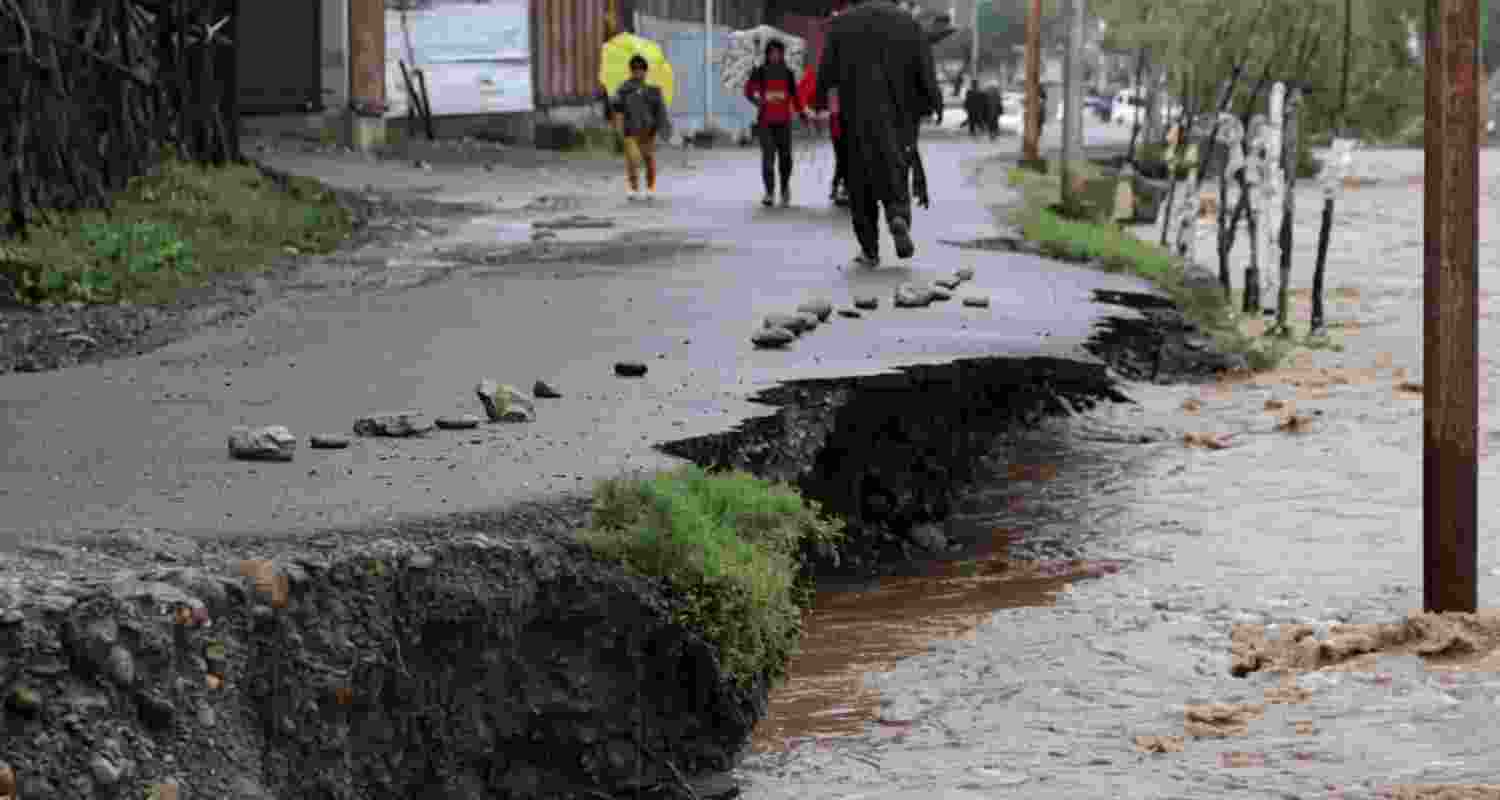 Cloudbursts and heavy rain triggered flash floods and landslides across Jammu and Kashmir, disrupting roads as the IMD warned of more rain and storms. Cloudbursts and heavy rain triggered flash floods and landslides across Jammu and Kashmir, disrupting roads as the IMD warned of more rain and storms.