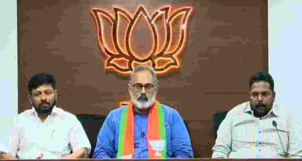 BJP Kerala president Rajeev Chandrasekhar along with the two former Congress leaders after they joined the party in Thiruvananthapuram ahead of Assembly elections. BJP Kerala president Rajeev Chandrasekhar along with the two former Congress leaders after they joined the party in Thiruvananthapuram ahead of Assembly elections.