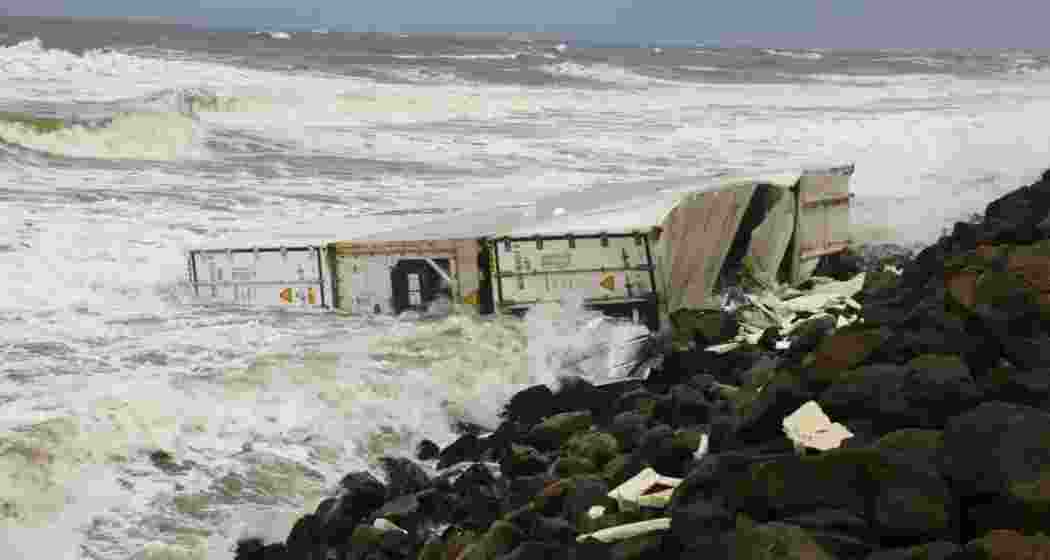 A container from the Wan Hai 503 lies on Vizhinjam beach as Kerala launches a citizen-driven app to report hazardous shipwreck debris along its coast. 65 containers have surfaced so far. A container from the Wan Hai 503 lies on Vizhinjam beach as Kerala launches a citizen-driven app to report hazardous shipwreck debris along its coast. 65 containers have surfaced so far.