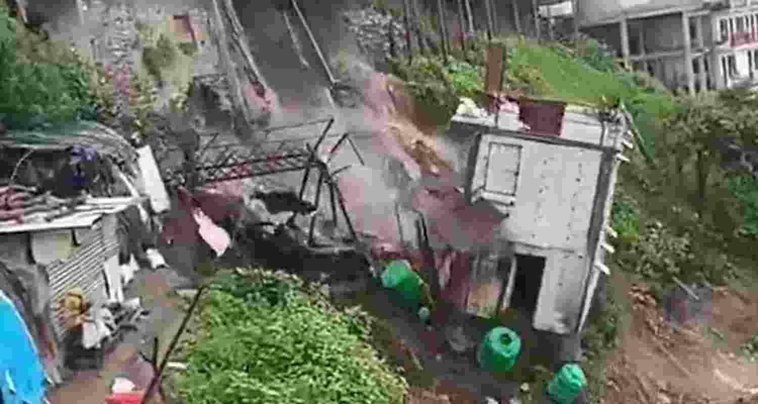 Landslide near shops at Kaddukhal on National Highway 707 A. Landslide near shops at Kaddukhal on National Highway 707 A.