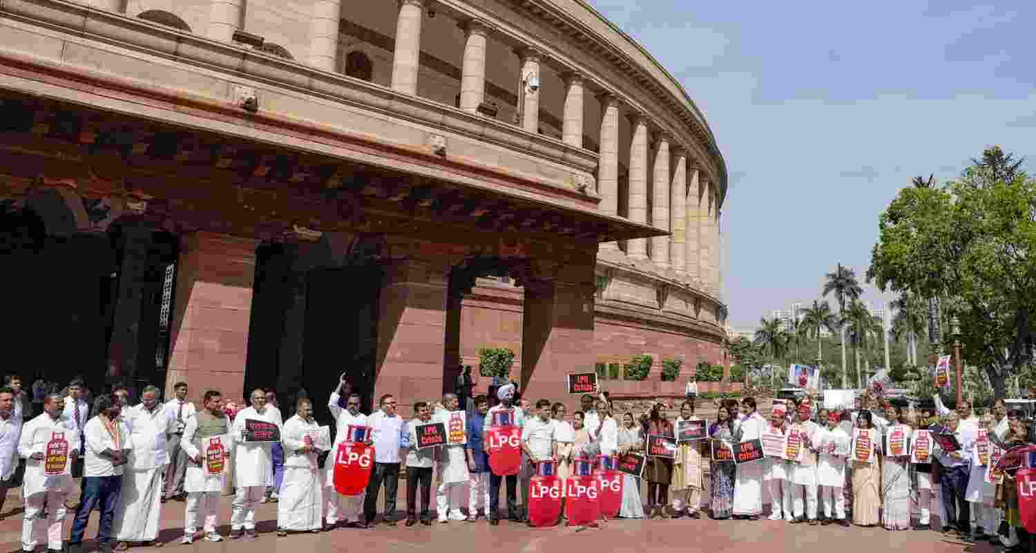 Congress MPs KC Venugopal, Hibi Eden, Manickam Tagore, Samajwadi Party MPs Ram Gopal Yadav, Dimple Yadav, Dharmendra Yadav, TMC MPs Dola Sen, Sagarika Ghose, and others stage a protest over "LPG crisis" during the second part of the Budget session of Parliament, in New Delhi, Friday, March 13, 2026. Congress MPs KC Venugopal, Hibi Eden, Manickam Tagore, Samajwadi Party MPs Ram Gopal Yadav, Dimple Yadav, Dharmendra Yadav, TMC MPs Dola Sen, Sagarika Ghose, and others stage a protest over "LPG crisis" during the second part of the Budget session of Parliament, in New Delhi, Friday, March 13, 2026.