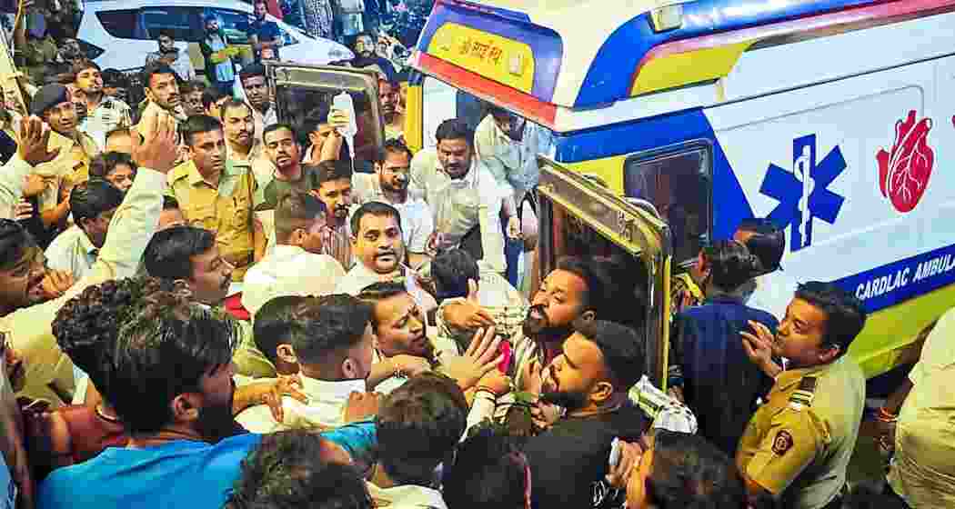 BJP MLA, Ganpat Gaikwad, opened fire on Mahesh Gaikwad, Shiv Sena chief of Kalyan, inside a police station in Ulhasnagar on Friday night. BJP MLA, Ganpat Gaikwad, opened fire on Mahesh Gaikwad, Shiv Sena chief of Kalyan, inside a police station in Ulhasnagar on Friday night.