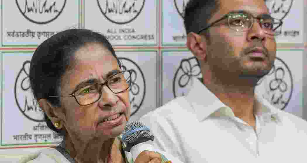 Trinamool leaders Mamata Banerjee and Abhishek Banerjee during a press conference at her Kalighat residence in Kolkata. Trinamool leaders Mamata Banerjee and Abhishek Banerjee during a press conference at her Kalighat residence in Kolkata.