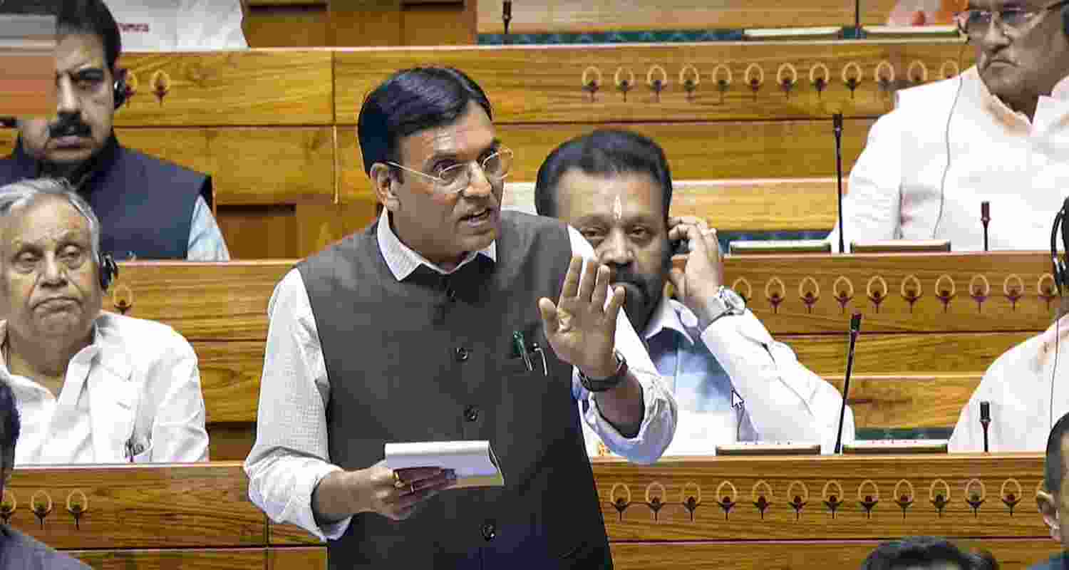 Union Minister Mansukh Mandaviya speaks in the Lok Sabha during the Monsoon session of Parliament, in New Delhi, Monday. Union Minister Mansukh Mandaviya speaks in the Lok Sabha during the Monsoon session of Parliament, in New Delhi, Monday.