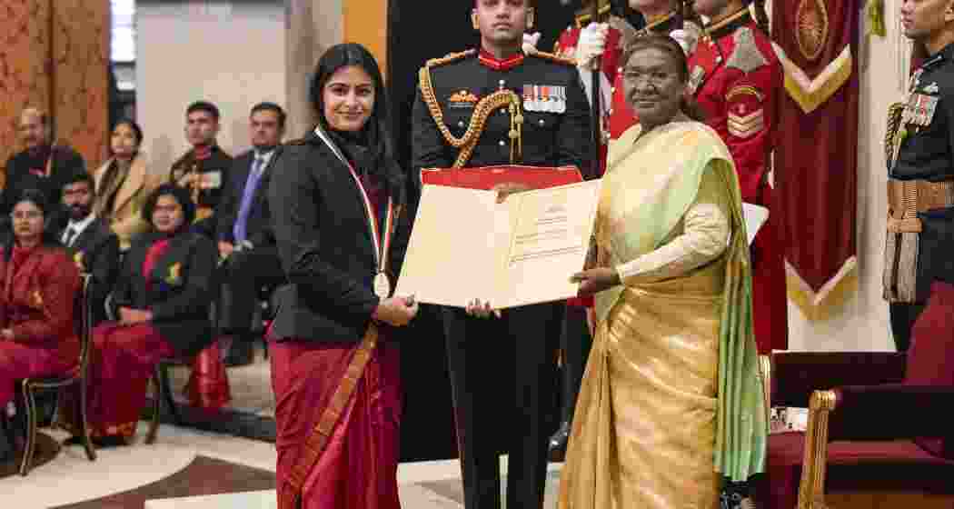 President Droupadi Murmu presents Major Dhyan Chand Khel Ratna Award to Olympic-medallist shooter Manu Bhaker during the National Sports and Adventure Awards 2024 at the Rashtrapati Bhavan, in New Delhi on Friday. President Droupadi Murmu presents Major Dhyan Chand Khel Ratna Award to Olympic-medallist shooter Manu Bhaker during the National Sports and Adventure Awards 2024 at the Rashtrapati Bhavan, in New Delhi on Friday.
