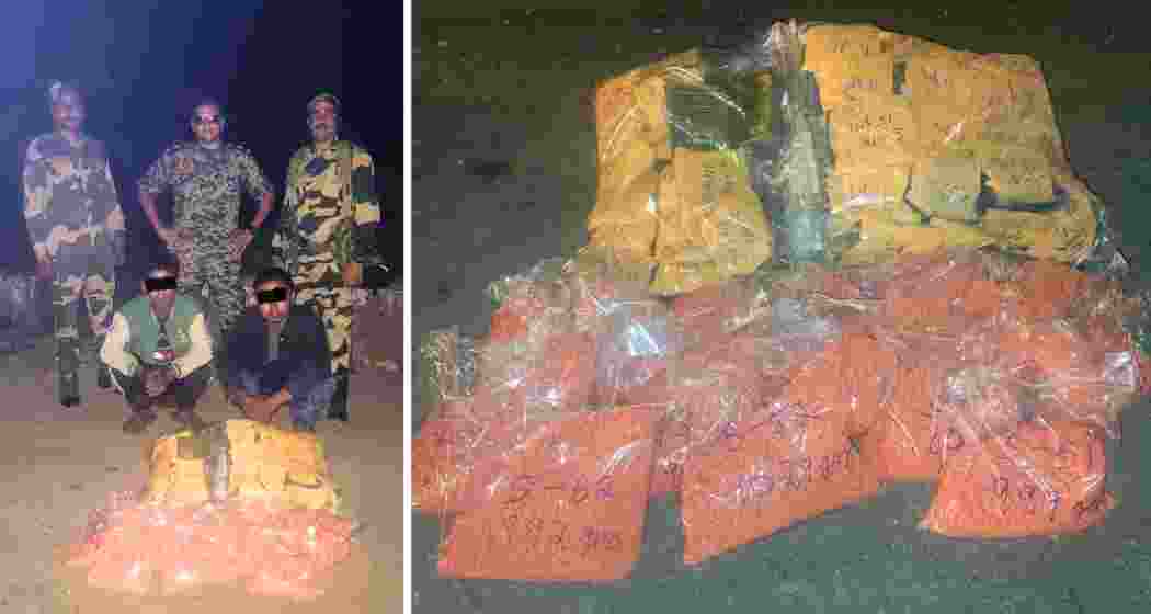 BSF and Mizoram Excise officials display heroin and methamphetamine seized near Aizawl, part of a Rs 26 crore drug bust. Two Myanmar nationals were arrested. BSF and Mizoram Excise officials display heroin and methamphetamine seized near Aizawl, part of a Rs 26 crore drug bust. Two Myanmar nationals were arrested.