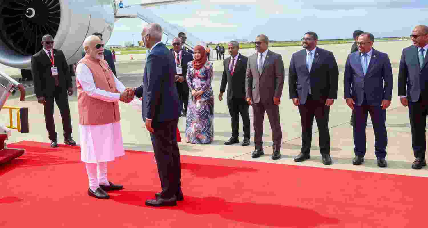 PM Narendra Modi arrives in Male, Maldives, to a warm welcome by President Mohamed Muizzu. PM Narendra Modi arrives in Male, Maldives, to a warm welcome by President Mohamed Muizzu.