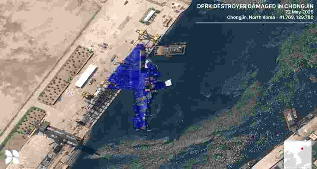 North Korea’s 5,000-tonne destroyer lies partially submerged at a shipyard following a failed launch. North Korea’s 5,000-tonne destroyer lies partially submerged at a shipyard following a failed launch.