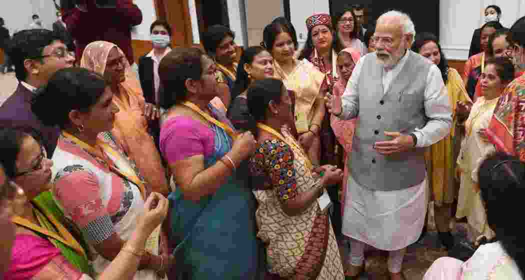 A file photo of Prime Minister Narendra Modi salutes 'nari shakti' on Women's Day. A file photo of Prime Minister Narendra Modi salutes 'nari shakti' on Women's Day.