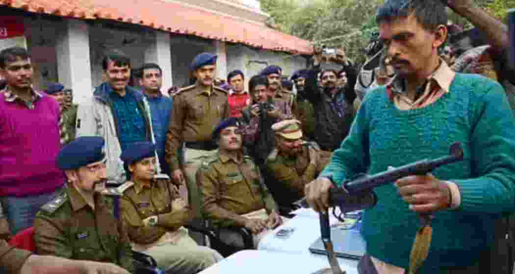 Security officials interact with surrendered Naxalites in Dantewada. Security officials interact with surrendered Naxalites in Dantewada.