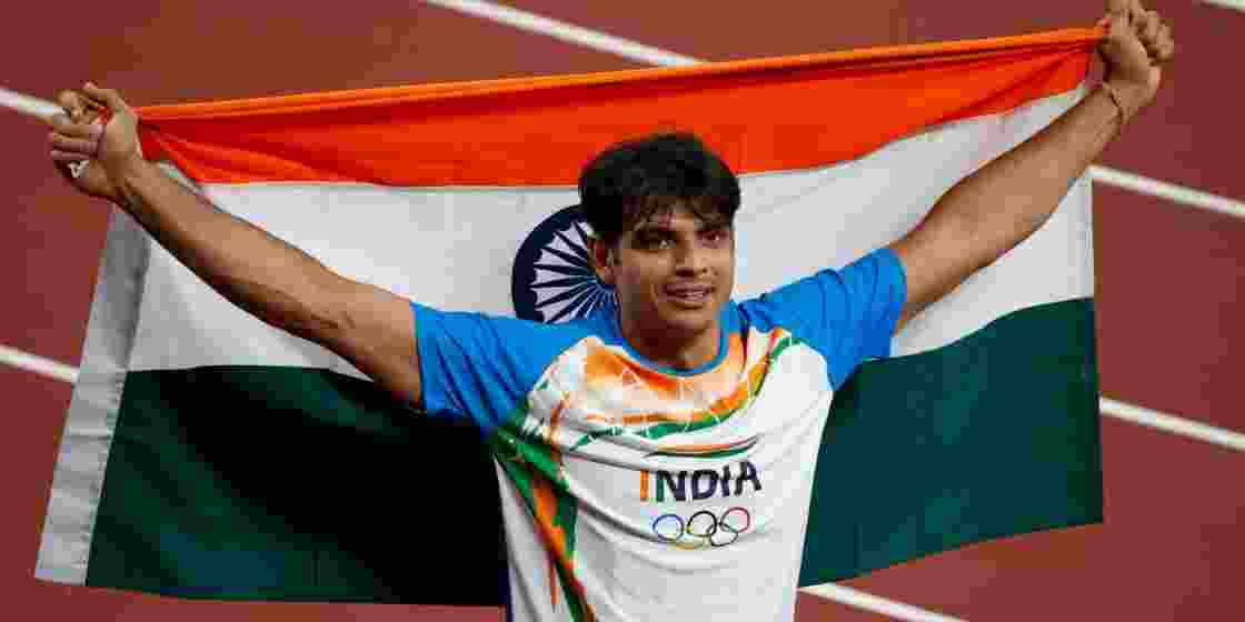 Neeraj Chopra celebrates after winning gold in the men's javelin throw at the Tokyo 2020 Olympics. Neeraj Chopra celebrates after winning gold in the men's javelin throw at the Tokyo 2020 Olympics.
