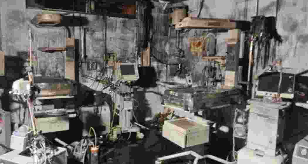 Charred remains inside the NICU are seen after a fire at the Maharani Laxmi Bai Medical College in Jhansi district, early Saturday. Charred remains inside the NICU are seen after a fire at the Maharani Laxmi Bai Medical College in Jhansi district, early Saturday.
