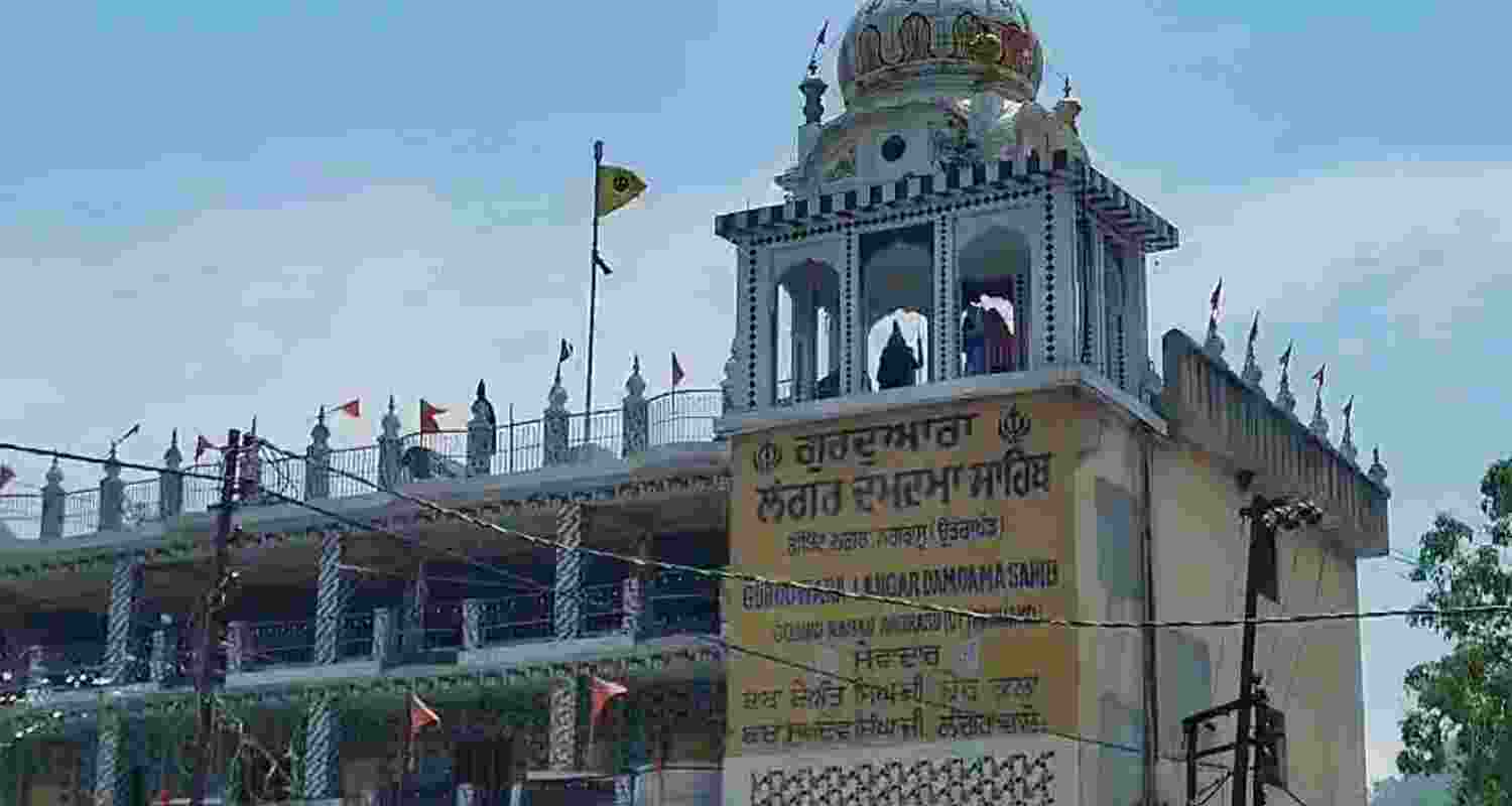 Nihang Sikhs remain stationed on the roof of a Gurdwara in Nagrasu, Uttarakhand, on Monday, demanding the release of four members of their sect arrested after a clash in Chamoli. Nihang Sikhs remain stationed on the roof of a Gurdwara in Nagrasu, Uttarakhand, on Monday, demanding the release of four members of their sect arrested after a clash in Chamoli.