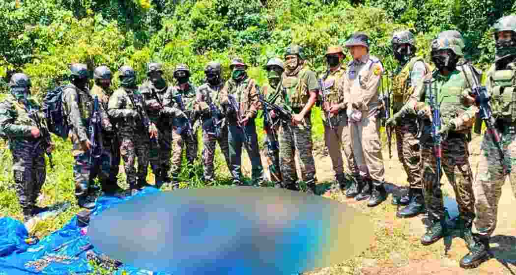 Security personnel in Arunachal Pradesh’s Changlang district display the bodies of two suspected NSCN militants in the Doimukh Nalla area. Security personnel in Arunachal Pradesh’s Changlang district display the bodies of two suspected NSCN militants in the Doimukh Nalla area.
