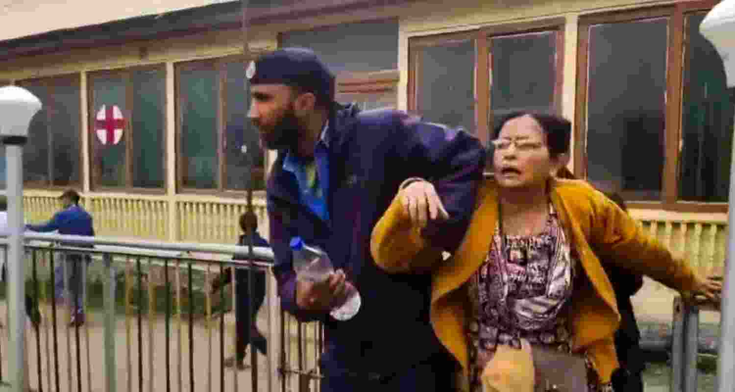 An injured being brought for treatment at a hospital, after terrorists attacked a group of tourists at Pahalgam, in Anantnag district, Jammu & Kashmir, Tuesday. An injured being brought for treatment at a hospital, after terrorists attacked a group of tourists at Pahalgam, in Anantnag district, Jammu & Kashmir, Tuesday.