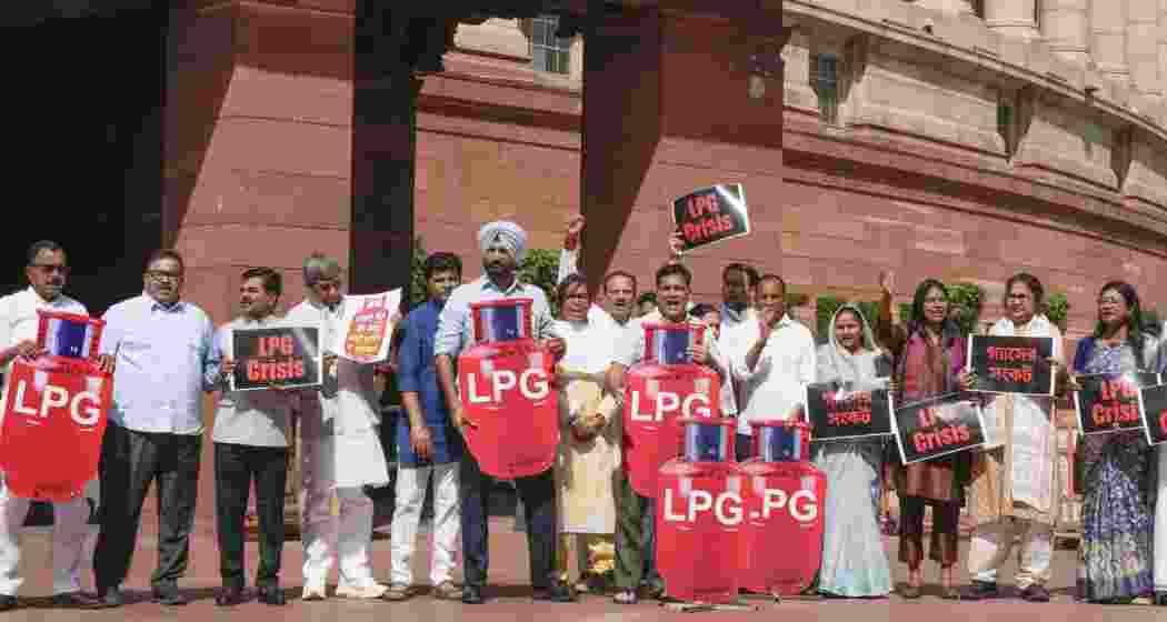 Congress MPs Amrinder Singh Raja Warring, Hibi Eden, TMC MP Dola Sen, and others stage a protest over "LPG crisis" during the second part of Budget session of Parliament, in New Delhi on Friday. Congress MPs Amrinder Singh Raja Warring, Hibi Eden, TMC MP Dola Sen, and others stage a protest over "LPG crisis" during the second part of Budget session of Parliament, in New Delhi on Friday.